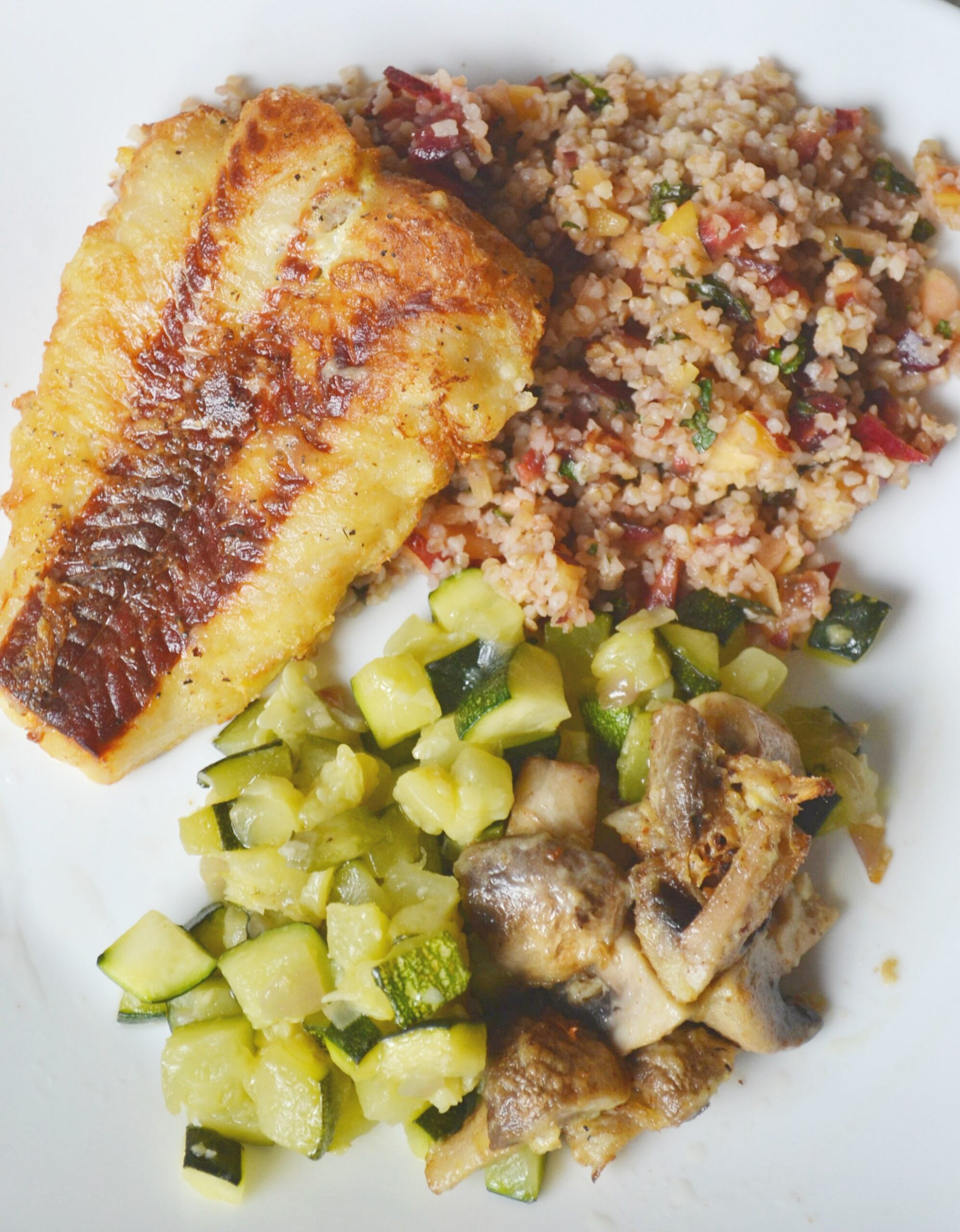 Fresh Fish sided with a bulgur tabbouleh salad